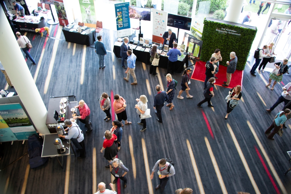 Conference delegates network during a session break at the 2nd Biosecurity Symposium